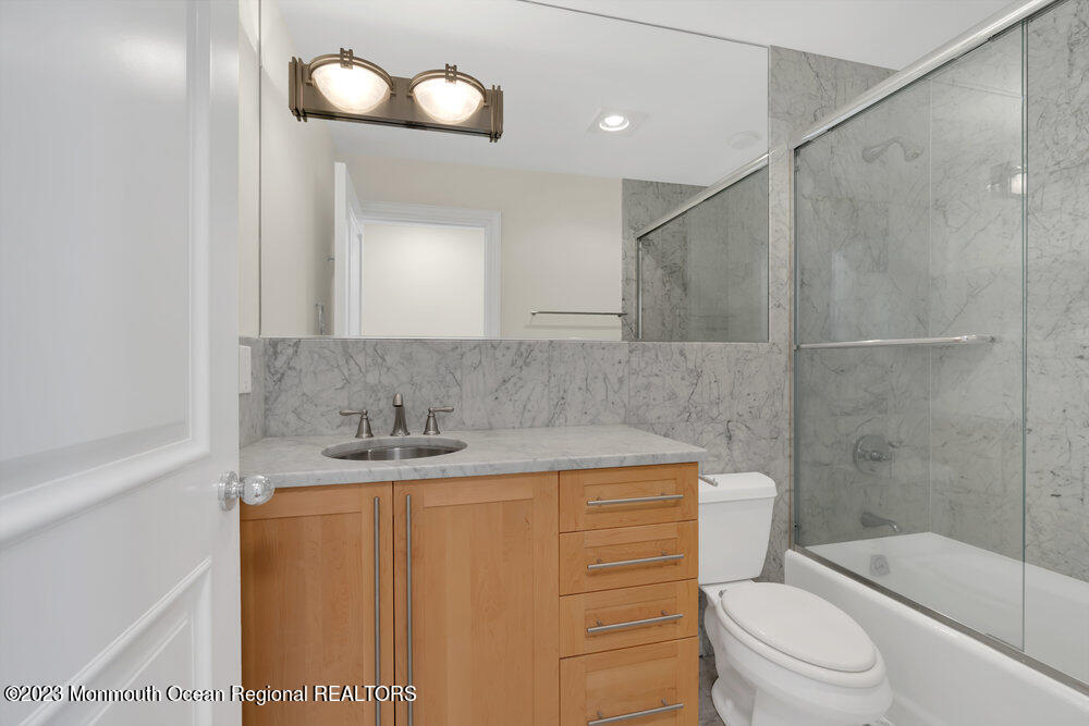 511 Passaic Avenue Spring Lake, NJ 07762 - Photo 97 of 105 a bathroom with a sink a toilet and shower