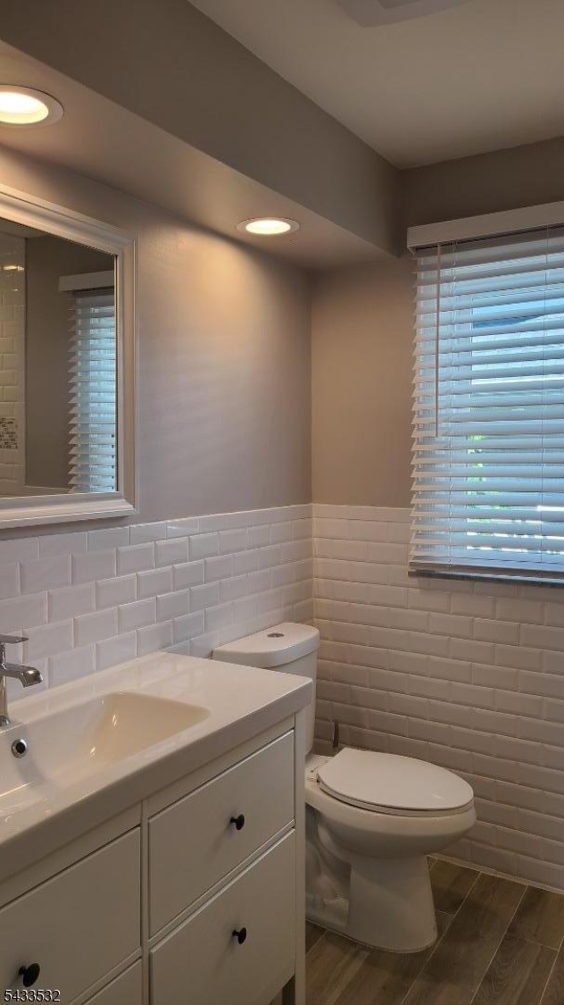 16 Ocean Street Millburn, NJ 07041 - Photo 15 of 26 a bathroom with a toilet a sink and mirror