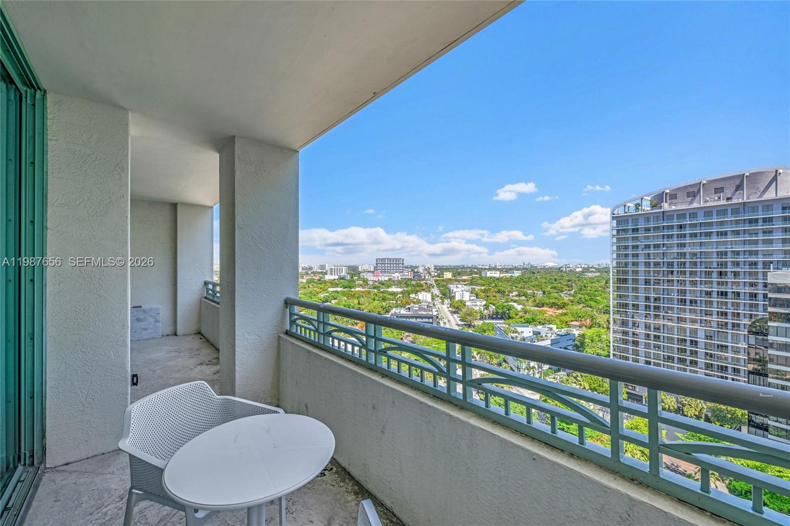 3350 Southwest 27th Avenue, Unit 1908 Coconut Grove, FL 33133 - Photo 12 of 17 a view of balcony with furniture