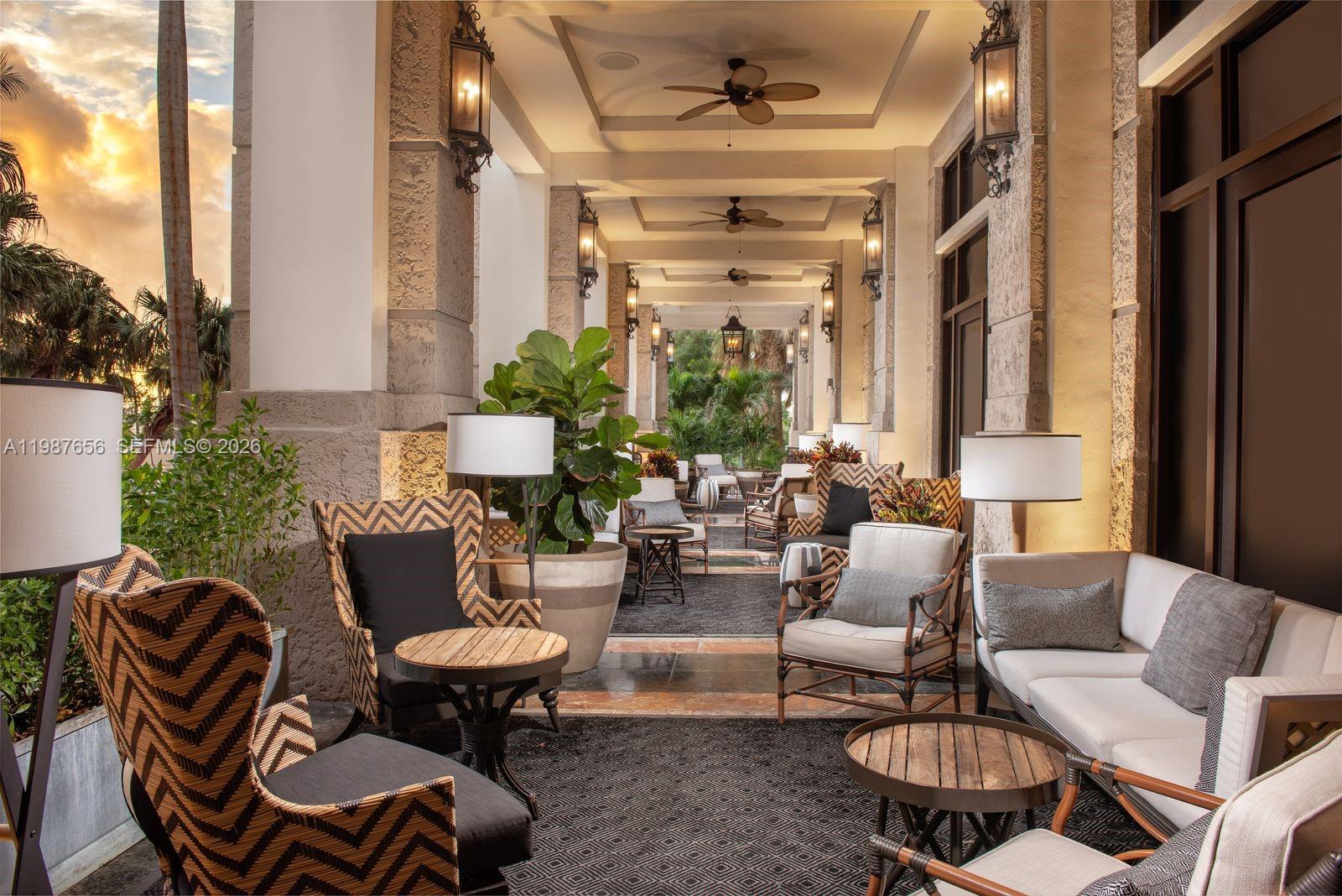 3350 Southwest 27th Avenue, Unit 1908 Coconut Grove, FL 33133 - Photo 16 of 17 a outdoor living space with furniture and a potted plant