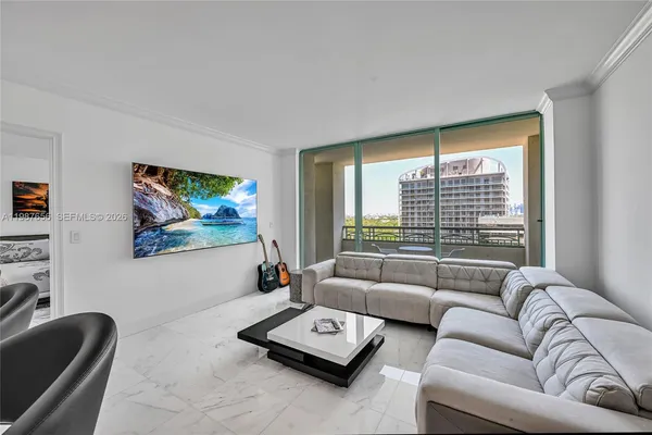 a living room with furniture and a window