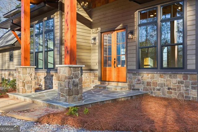 a living room with furniture fireplace and a flat screen tv