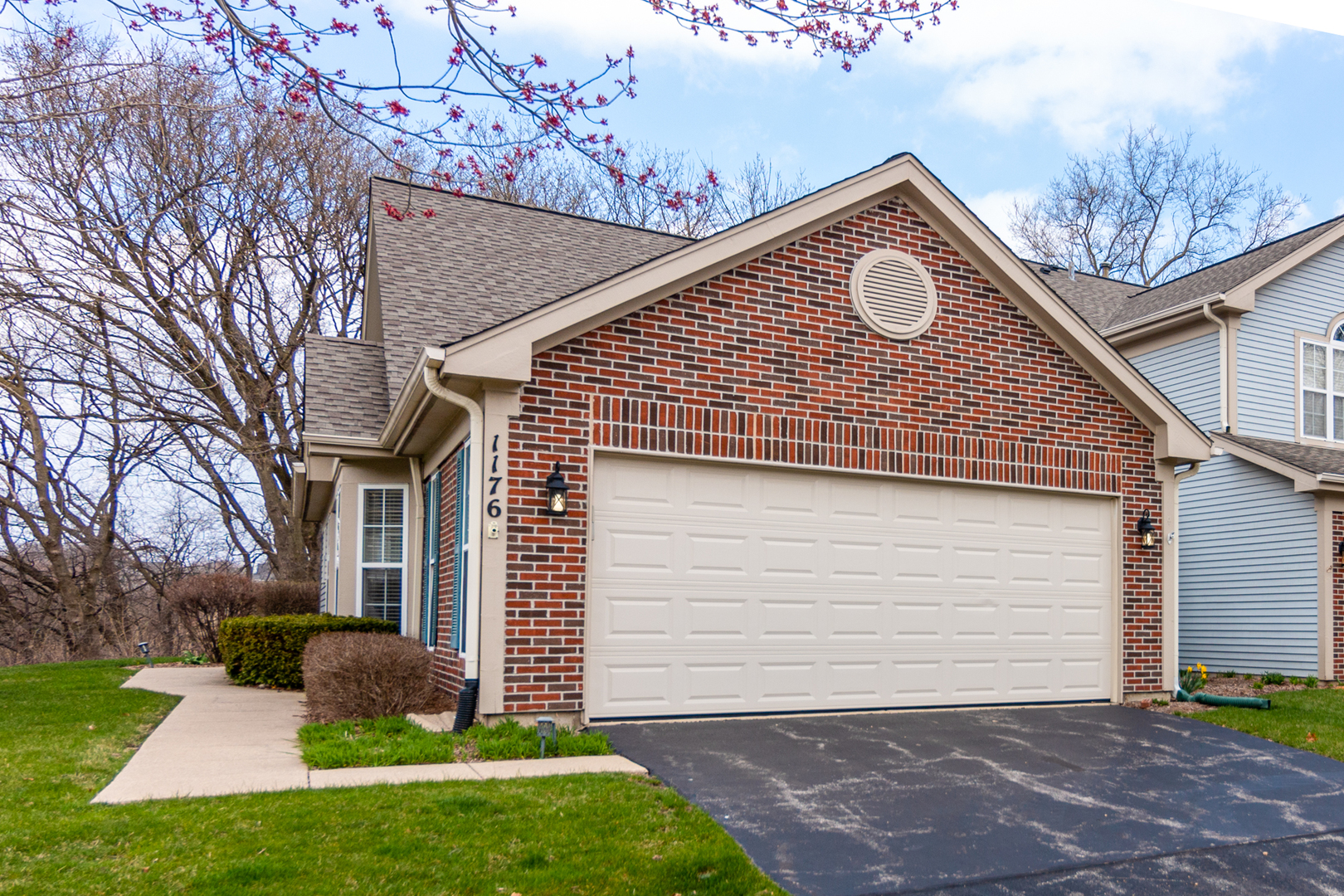 1176 Coldspring Road Elgin, IL 60120 - Photo 1 of 24 a front view of house with yard