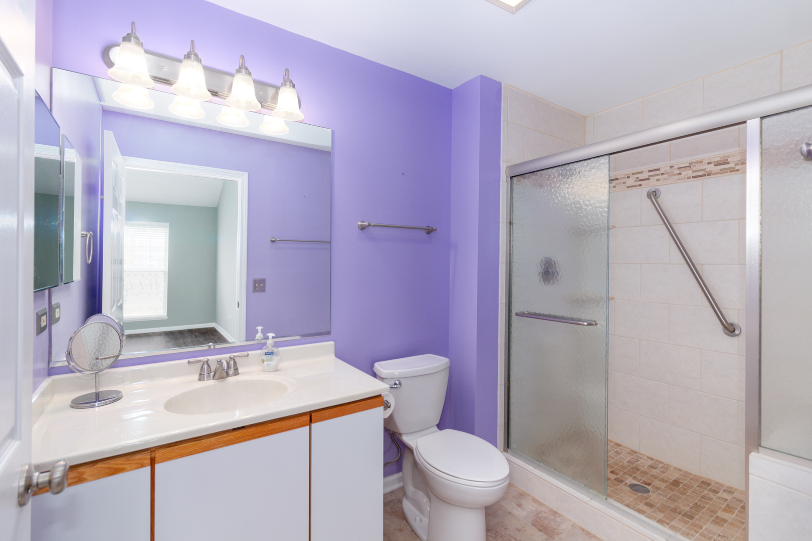 1176 Coldspring Road Elgin, IL 60120 - Photo 13 of 24 a bathroom with a sink vanity granite toilet and shower
