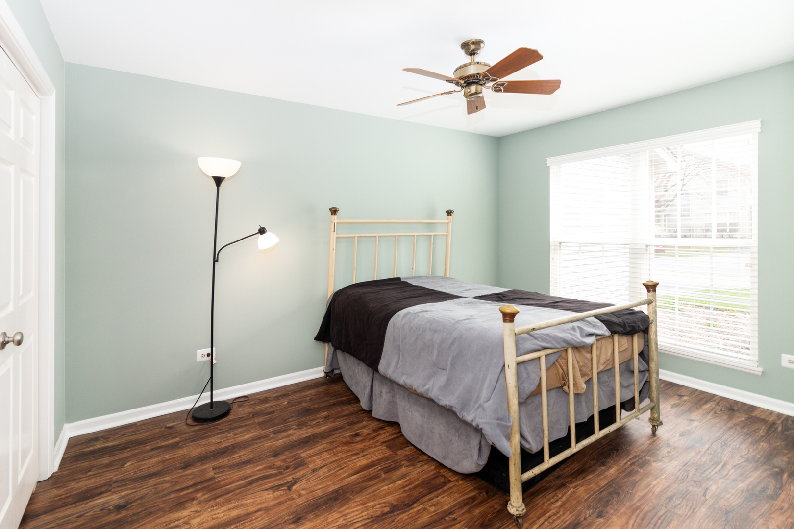 1176 Coldspring Road Elgin, IL 60120 - Photo 15 of 24 a bedroom with a bed and a ceiling fan