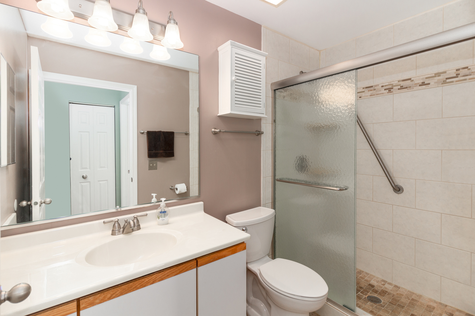 1176 Coldspring Road Elgin, IL 60120 - Photo 16 of 24 a bathroom with a sink toilet and shower