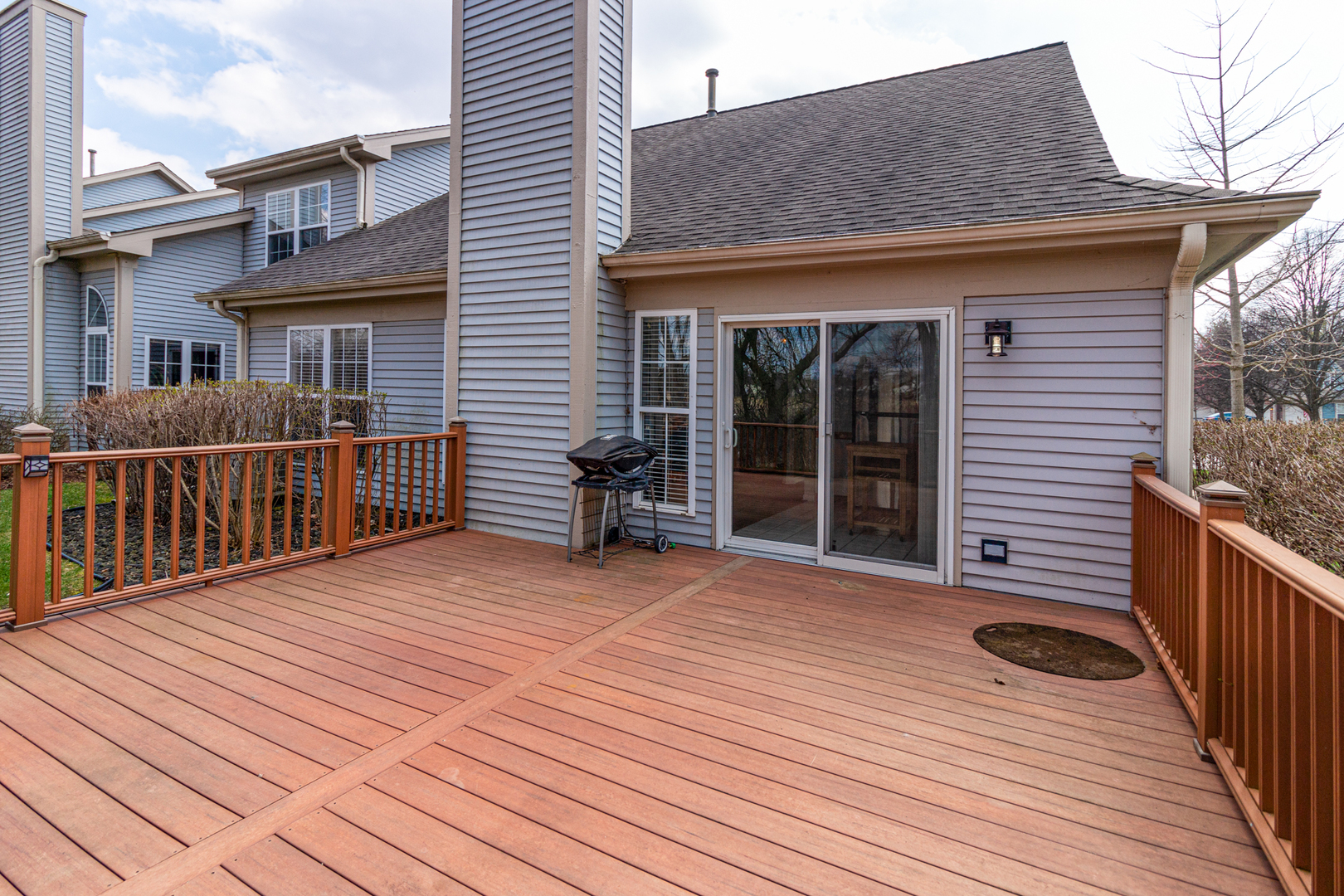 1176 Coldspring Road Elgin, IL 60120 - Photo 19 of 24 a view of a house with wooden deck