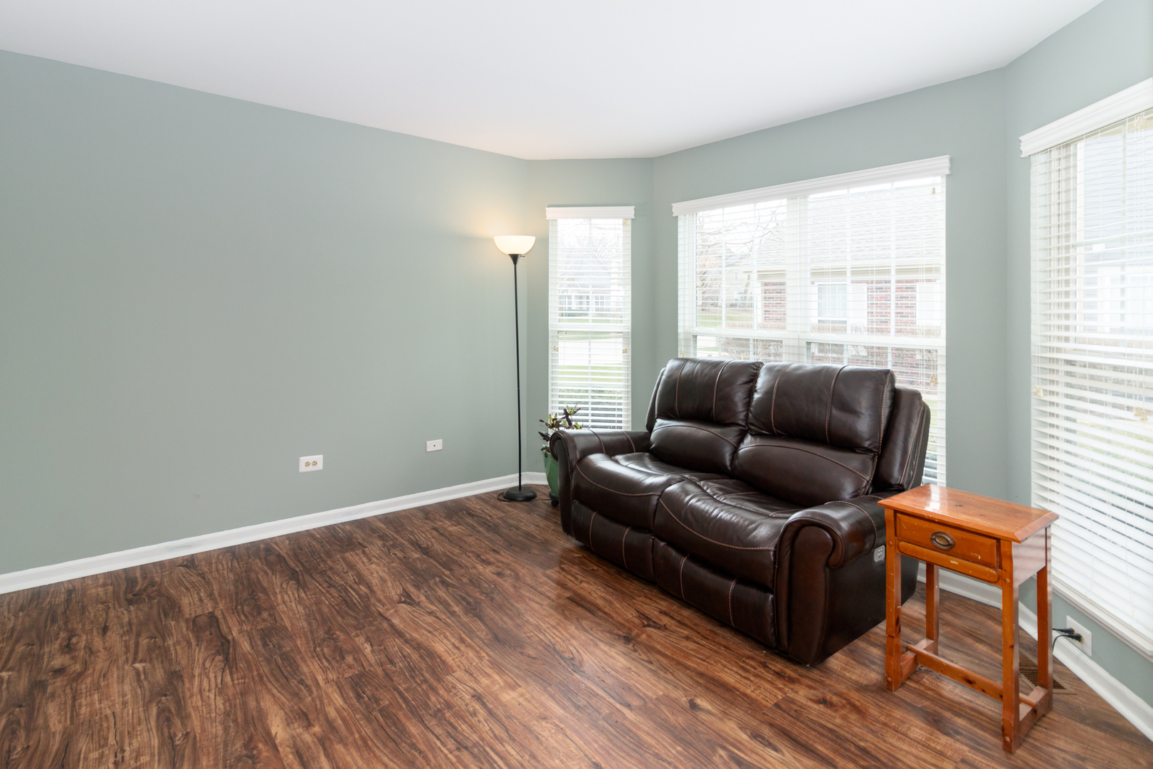 1176 Coldspring Road Elgin, IL 60120 - Photo 3 of 24 a living room with furniture and a window