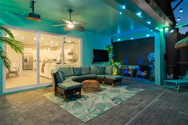 a outdoor living space with furniture and a potted plant