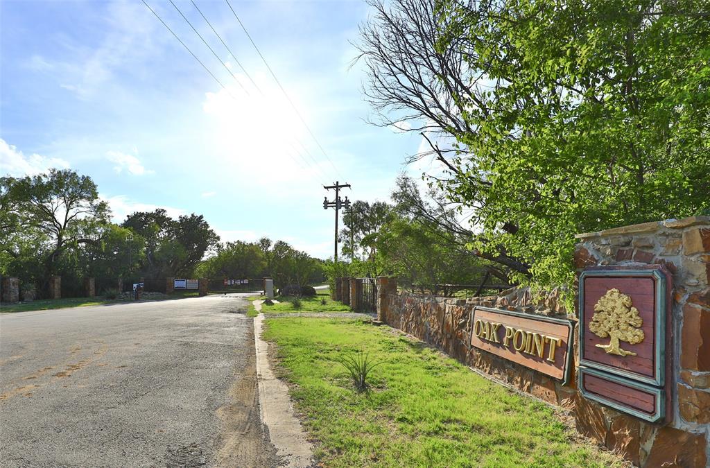 Tbd Oak Point Drive May, TX 76857 - Photo 3 of 14 a view of a street with outdoor space