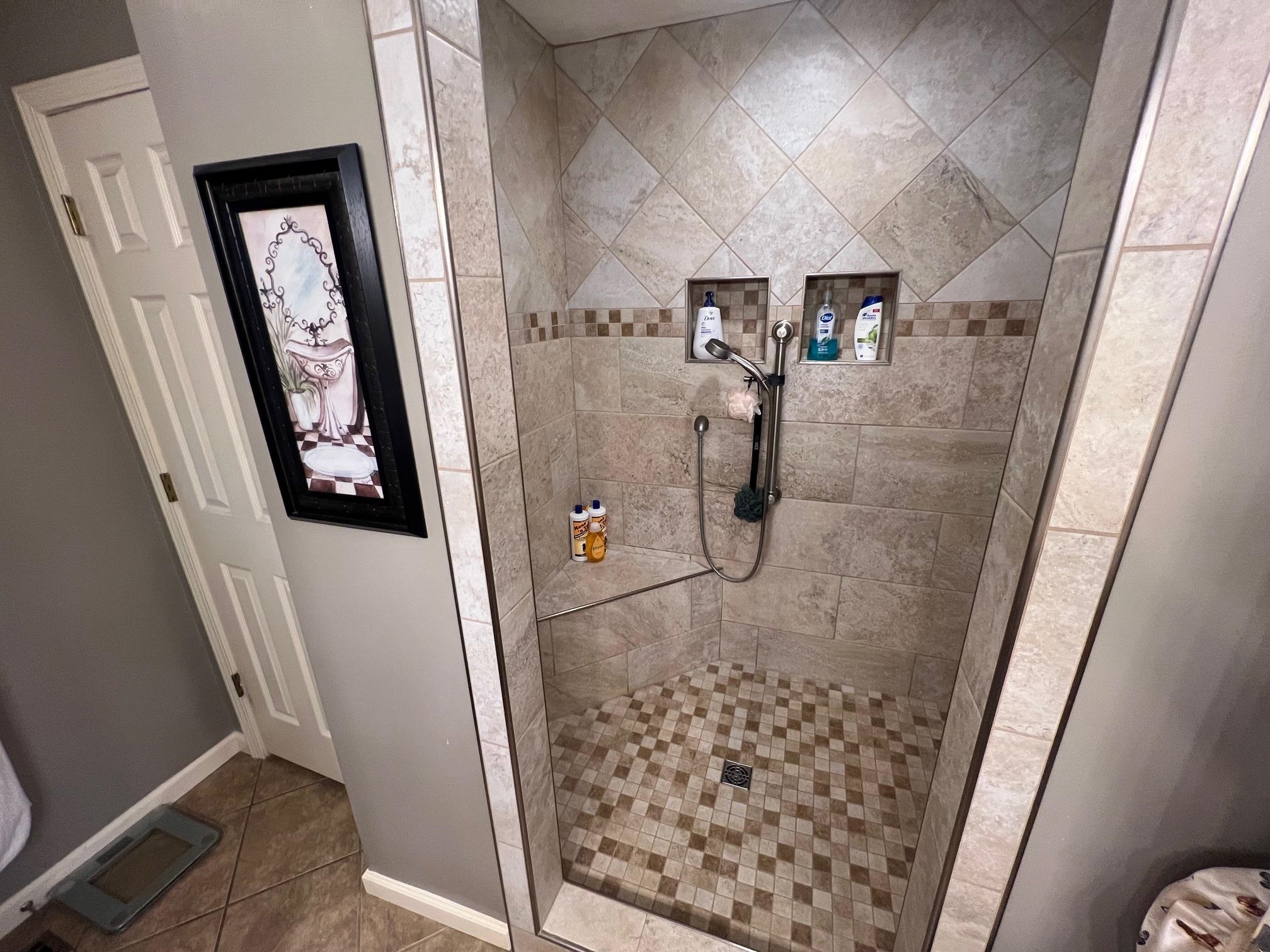 880 Double Springs Loop Savannah, TN 38372 - Photo 13 of 40 a bathroom with a shower and a sink