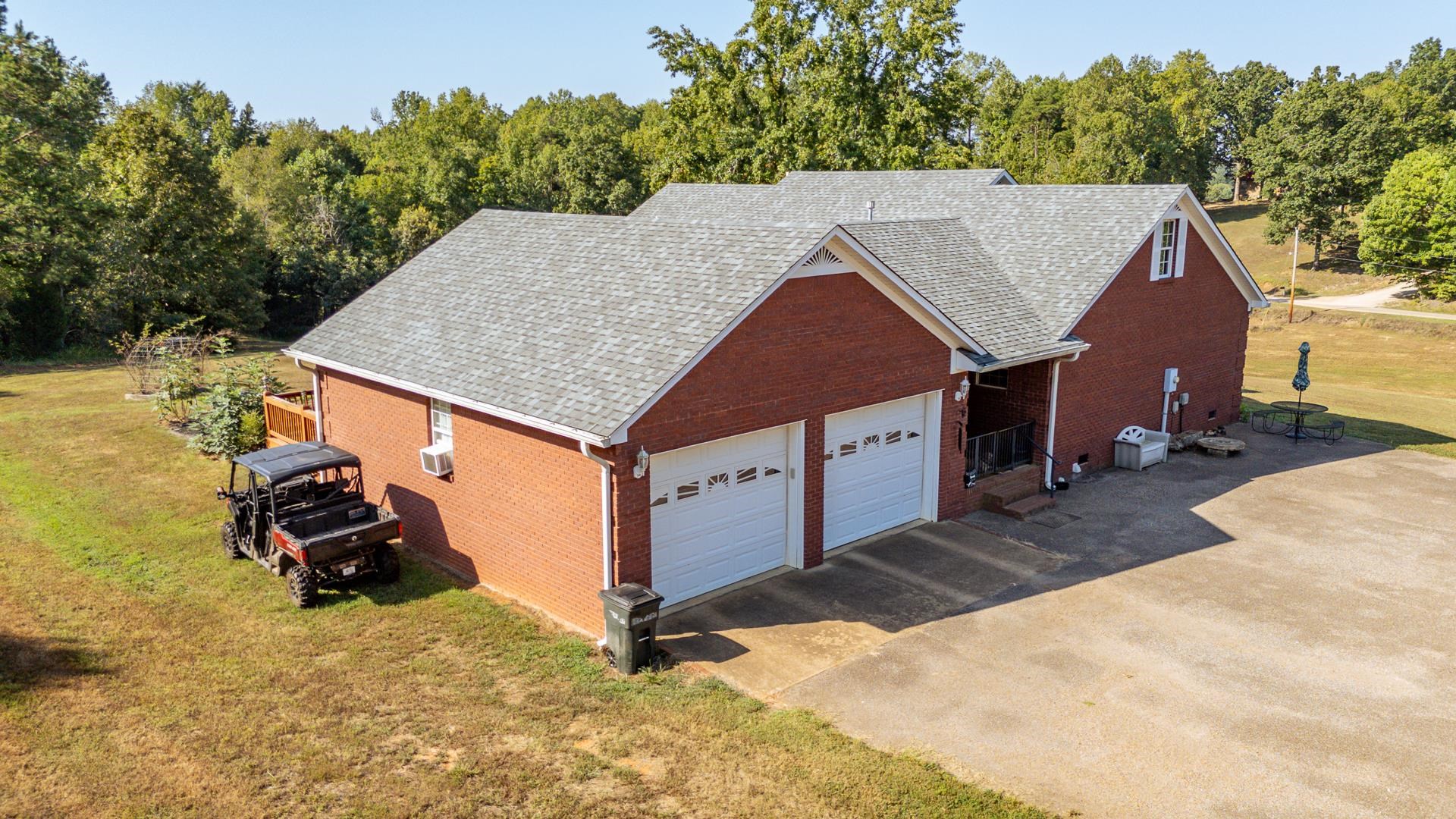 880 Double Springs Loop Savannah, TN 38372 - Photo 25 of 40 an aerial view of a house having yard