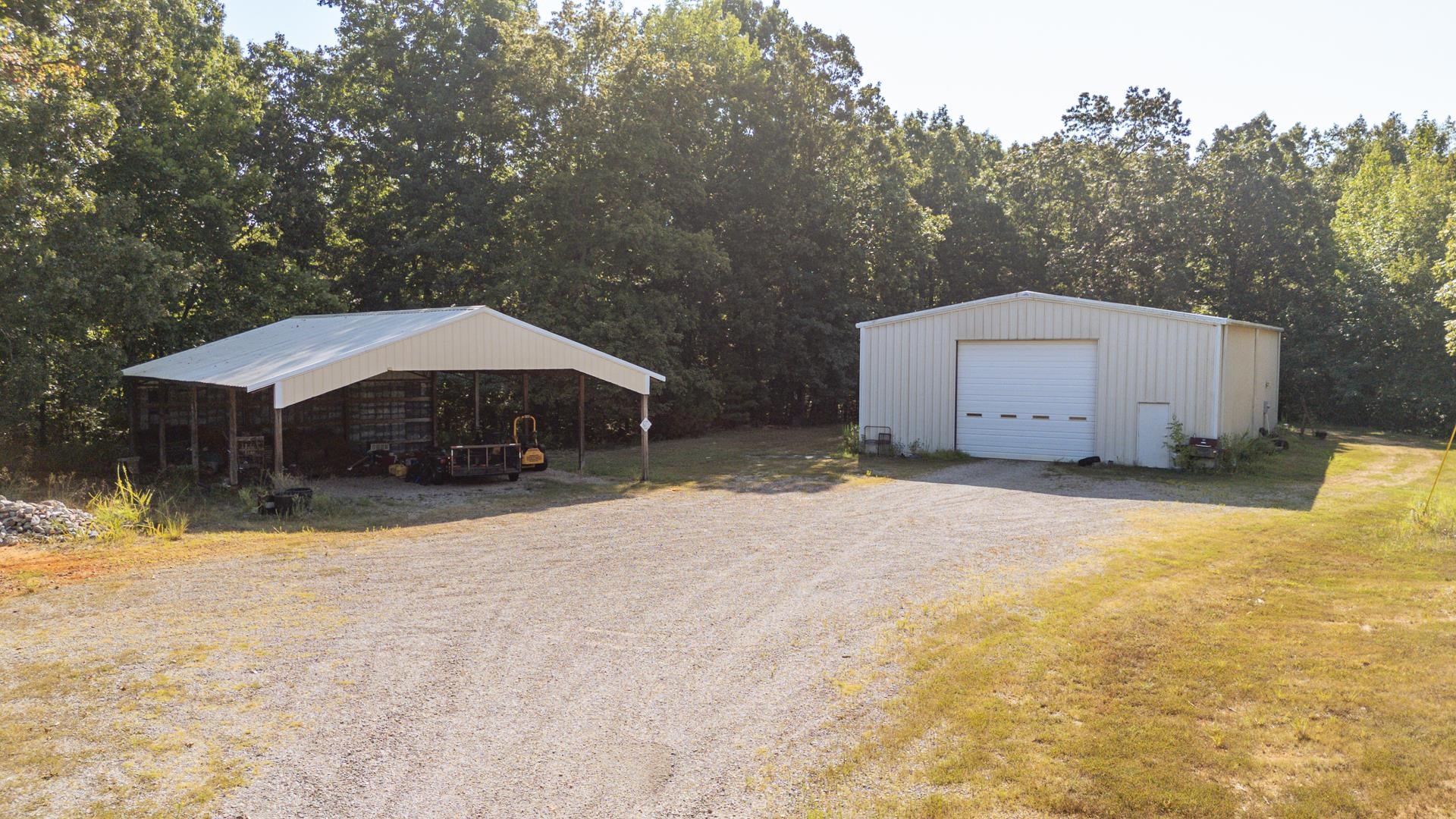 880 Double Springs Loop Savannah, TN 38372 - Photo 27 of 40 a house view with a outdoor space