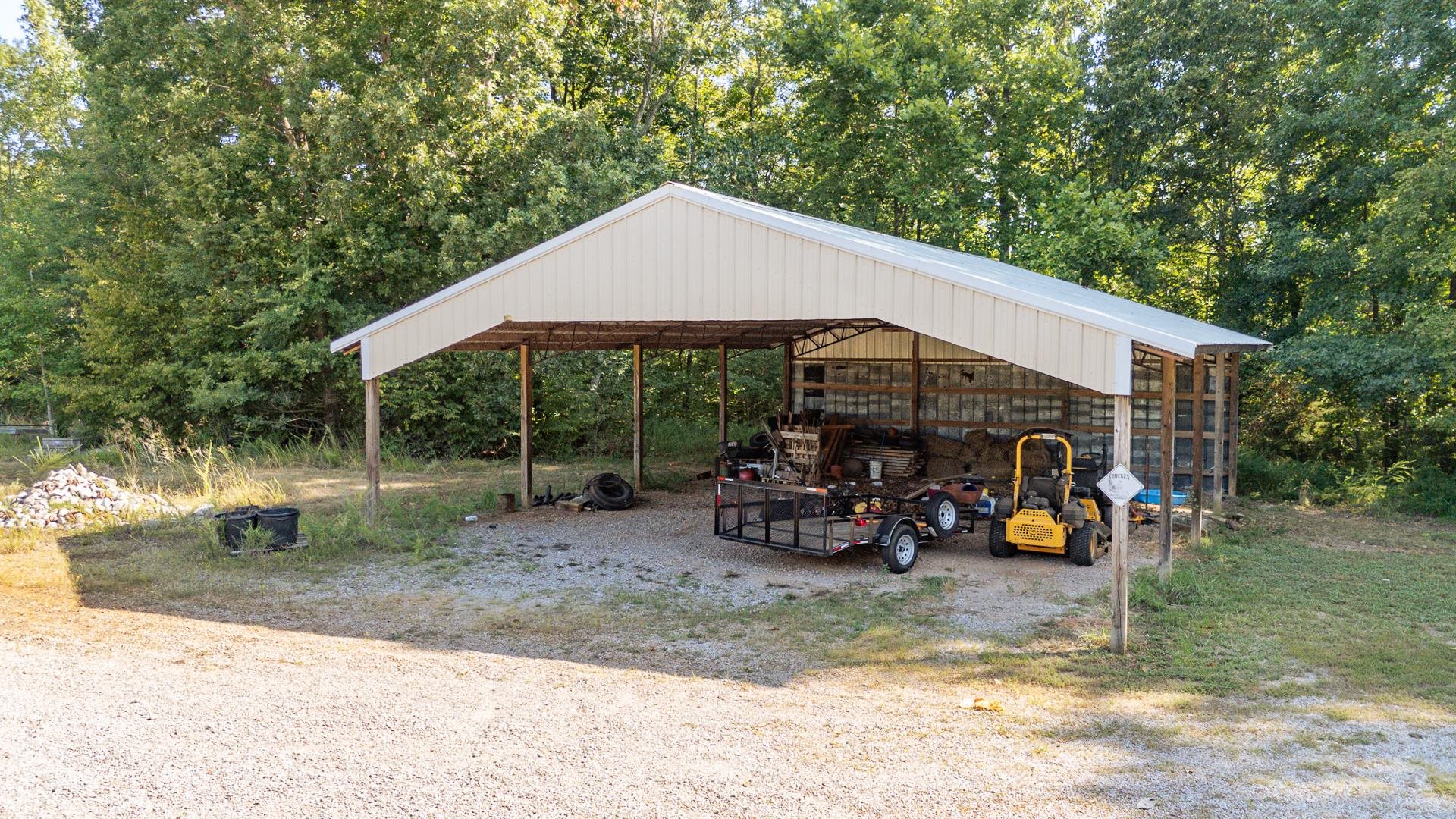 880 Double Springs Loop Savannah, TN 38372 - Photo 28 of 40 a view of a house with backyard