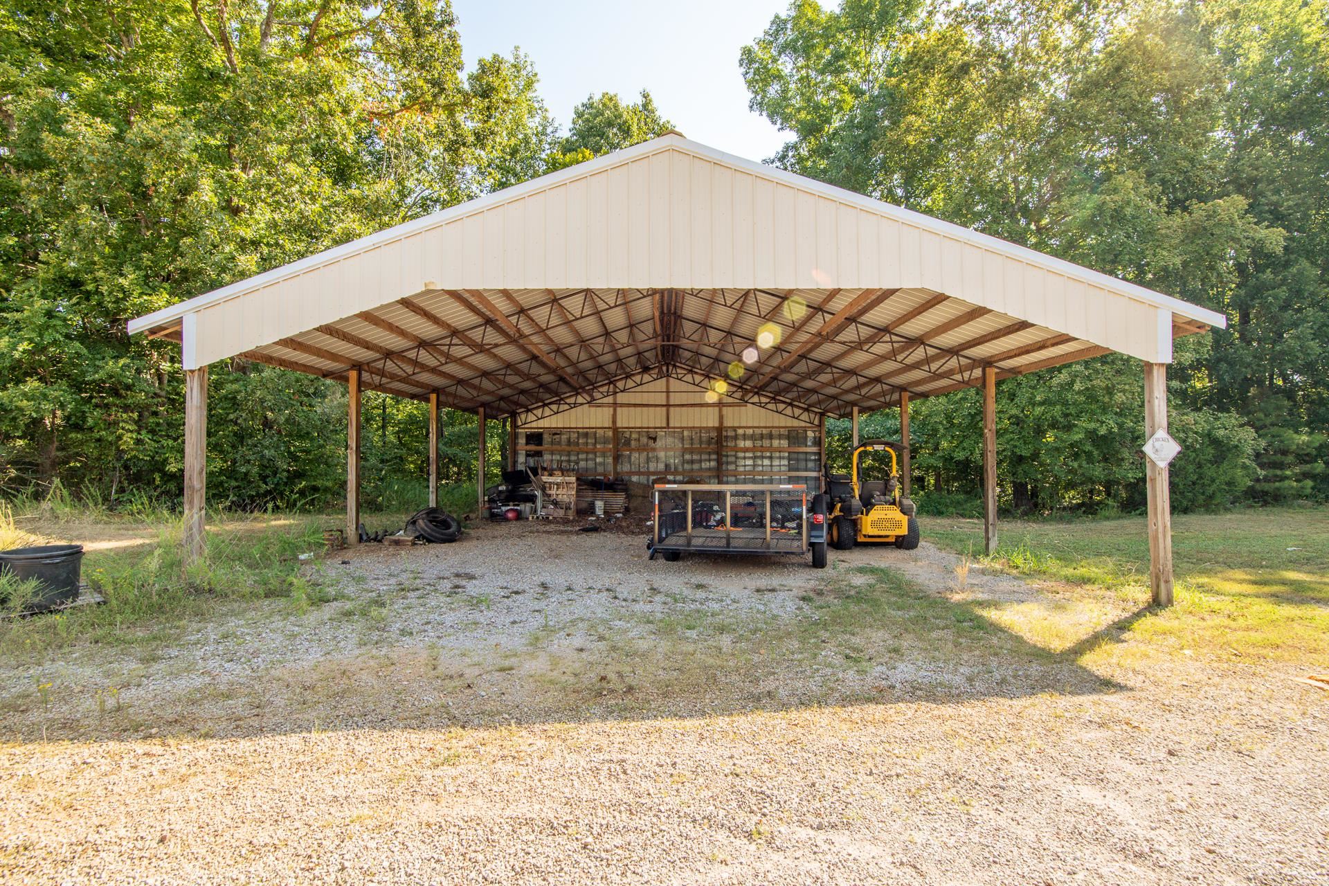 880 Double Springs Loop Savannah, TN 38372 - Photo 29 of 40 a view of a house with backyard and sitting area