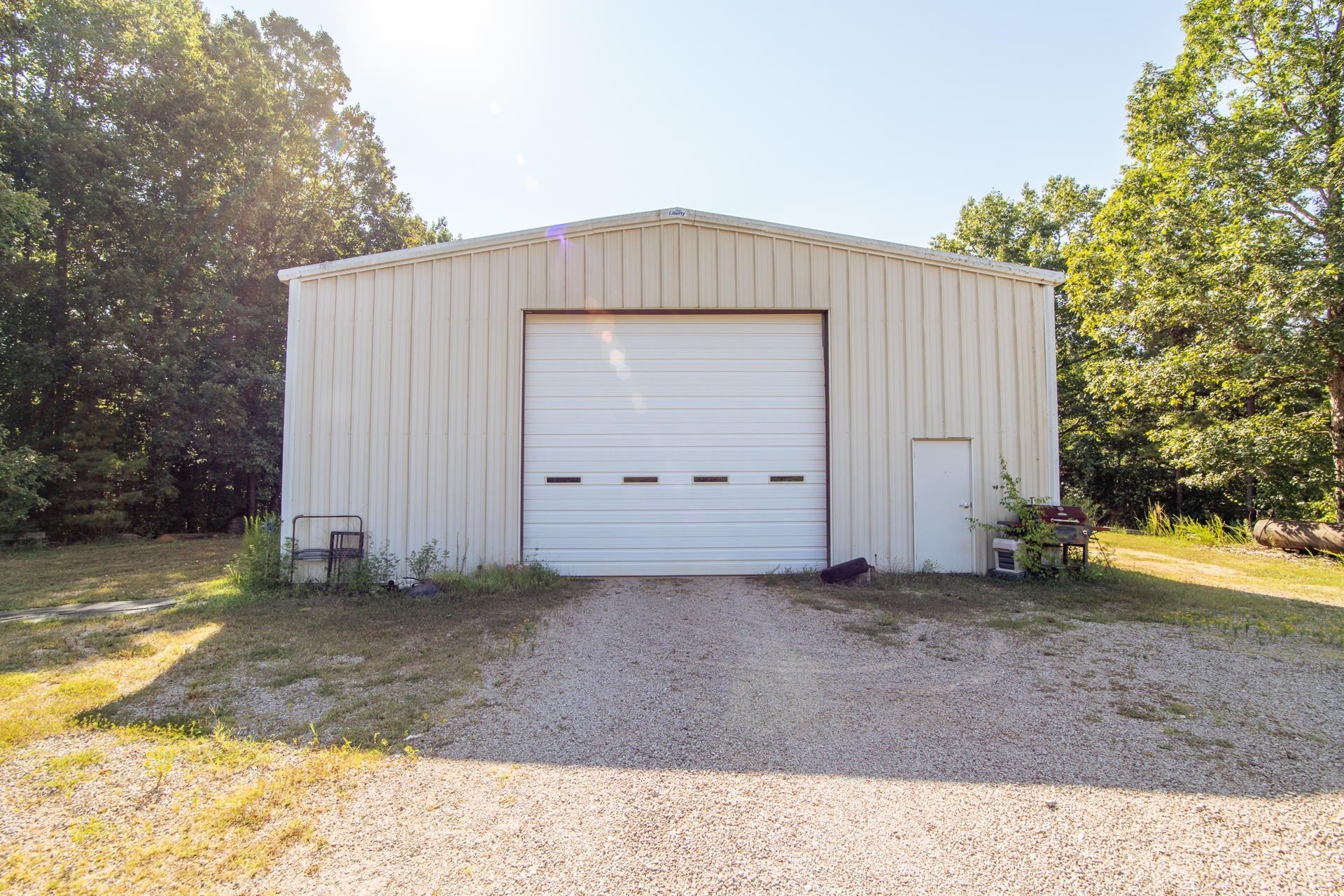 880 Double Springs Loop Savannah, TN 38372 - Photo 30 of 40 a view of a house with backyard