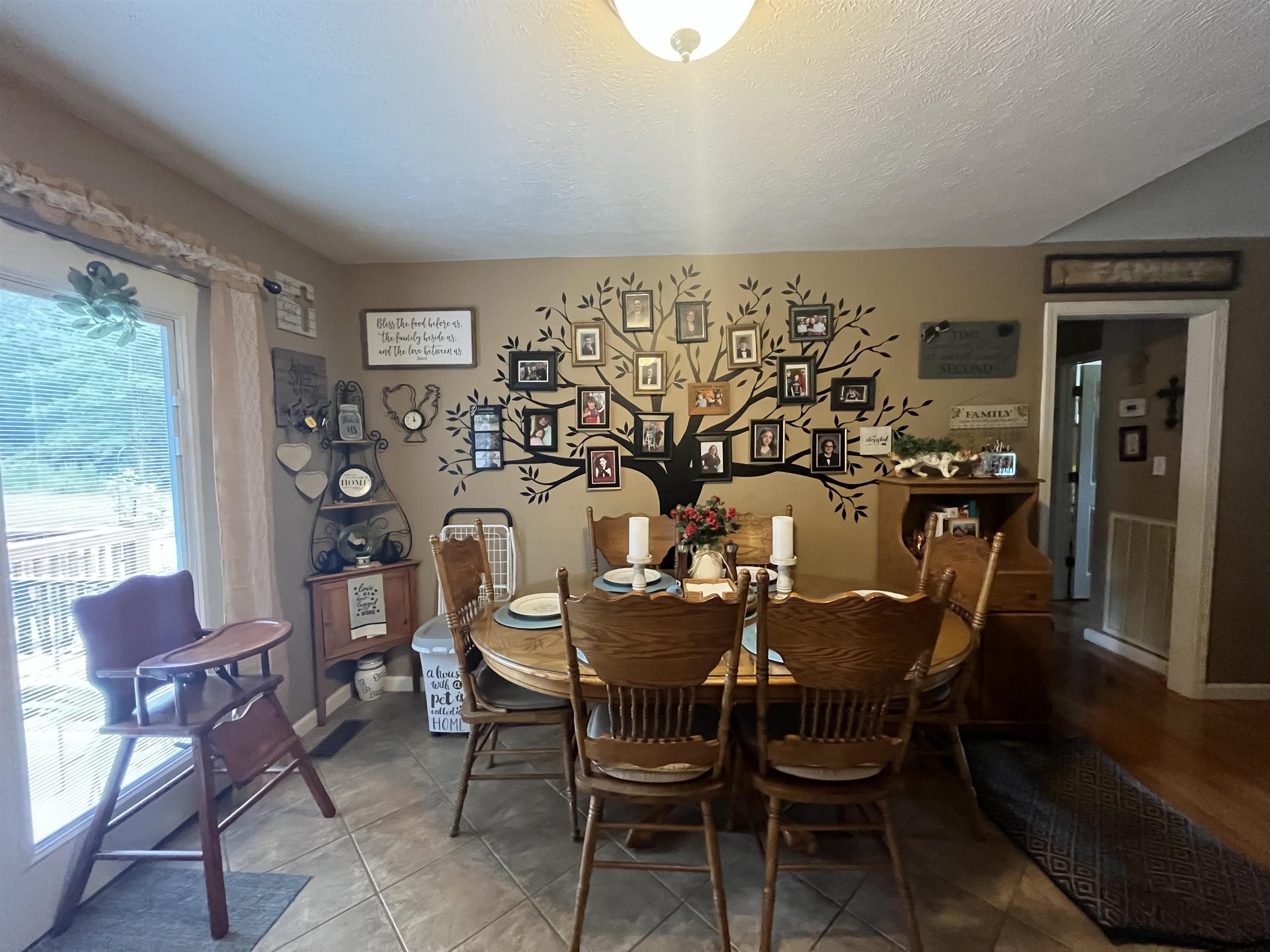 880 Double Springs Loop Savannah, TN 38372 - Photo 6 of 40 a dining room with furniture and window