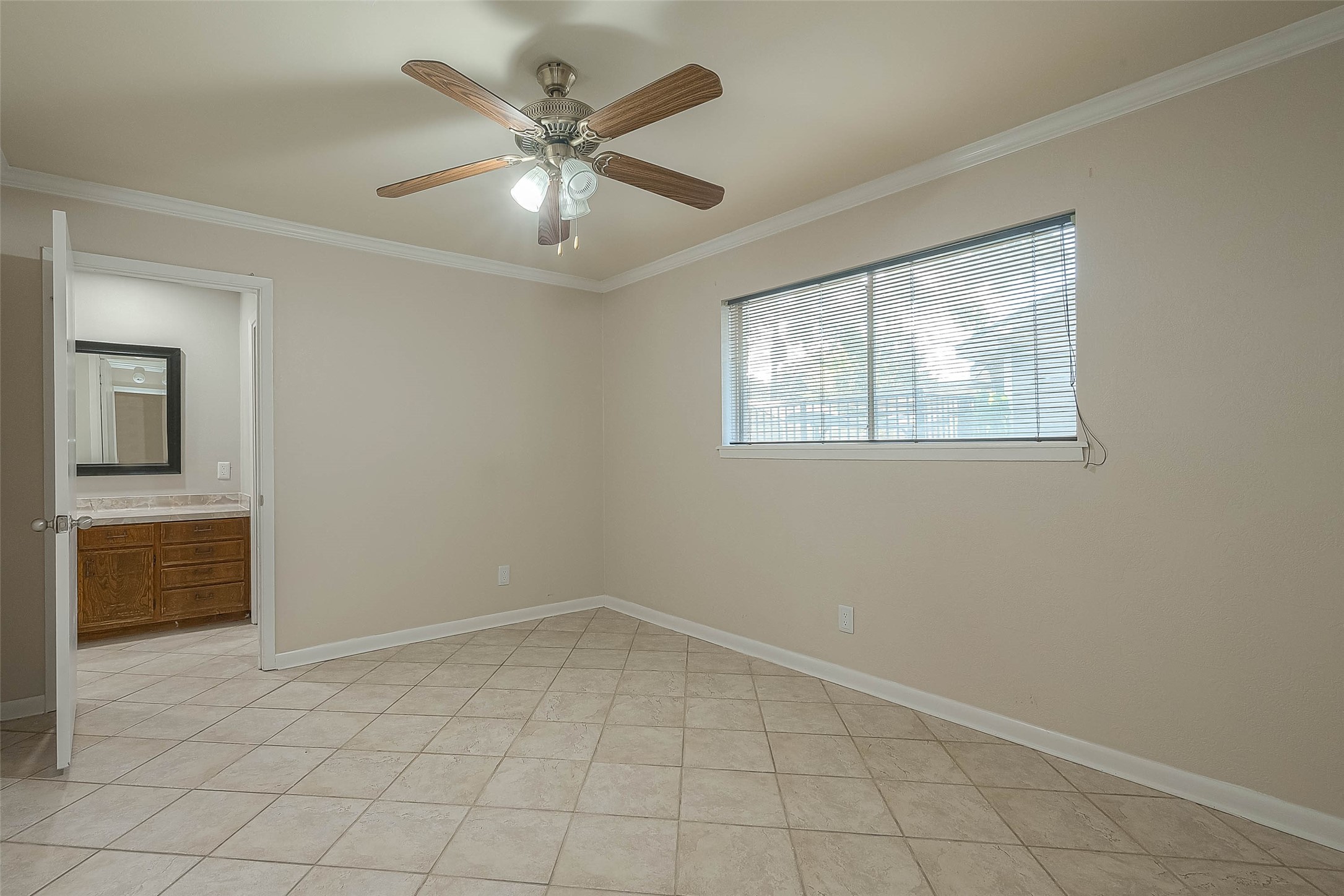 1503 Miles Street Rosenberg, TX 77471 - Photo 18 of 25 a view of an empty room with a window