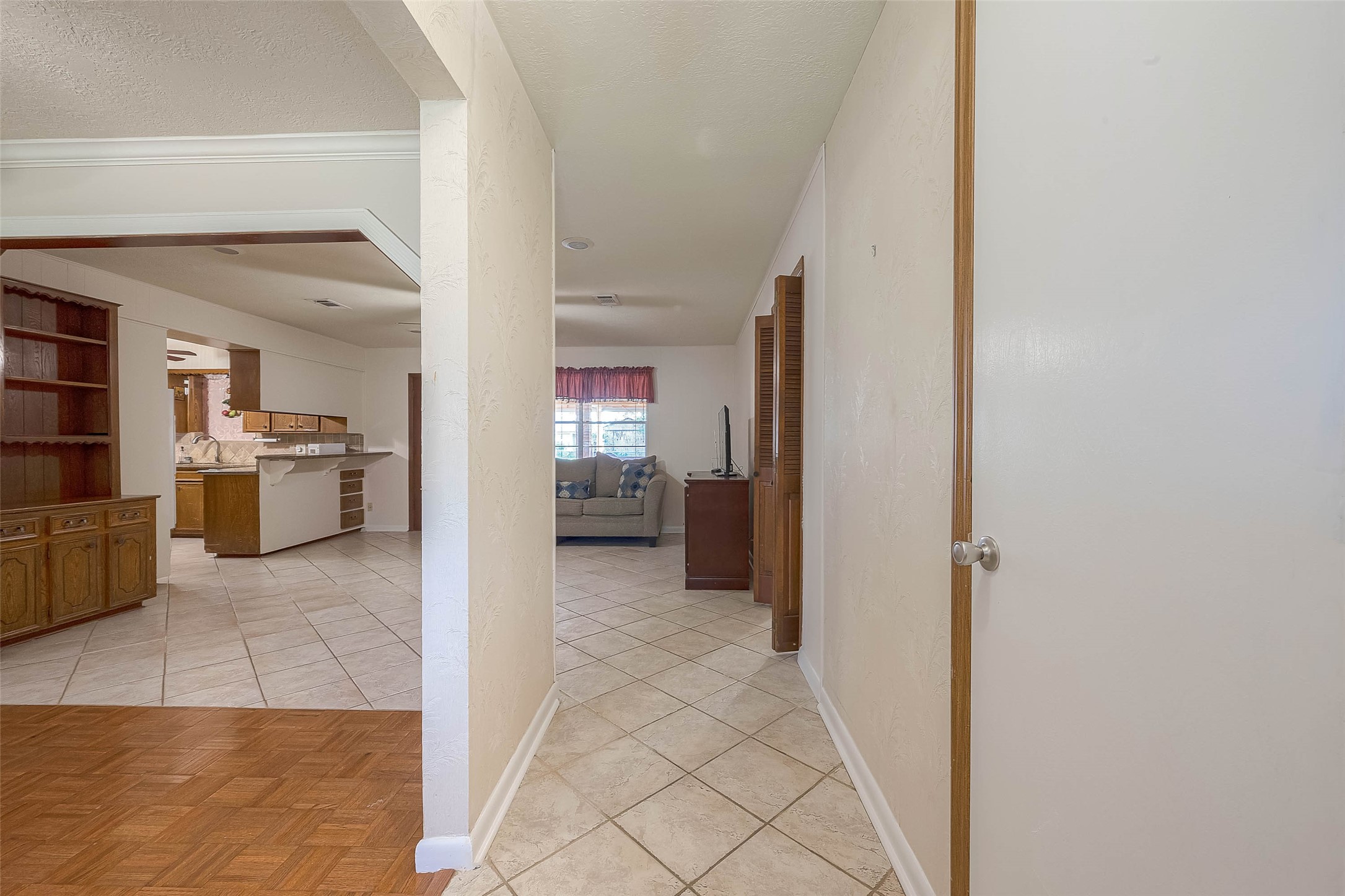 1503 Miles Street Rosenberg, TX 77471 - Photo 2 of 25 a view of a kitchen from the hallway