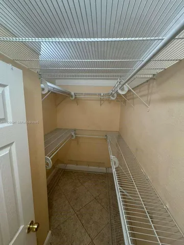 a view of a walk in closet