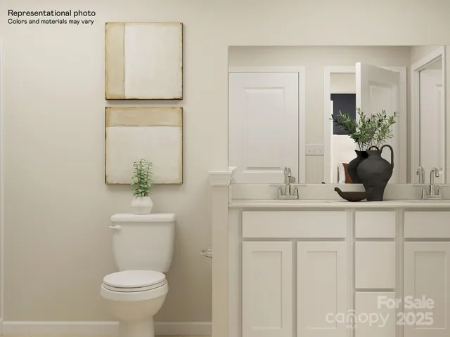 a view of a bathroom with a sink and mirror