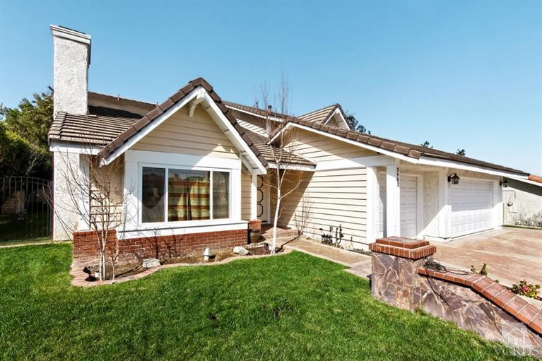 3903 Southhampton Road Moorpark, CA 93021 - Photo 2 of 29 front view of a house with a yard