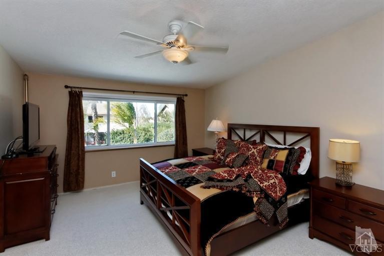3903 Southhampton Road Moorpark, CA 93021 - Photo 14 of 29 a bed sitting in a bedroom next to a window