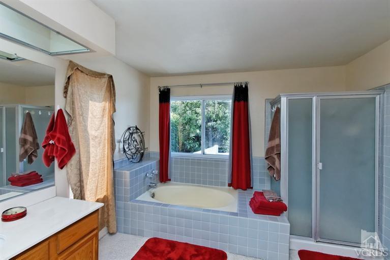 3903 Southhampton Road Moorpark, CA 93021 - Photo 16 of 29 a bedroom with a bed and a dresser