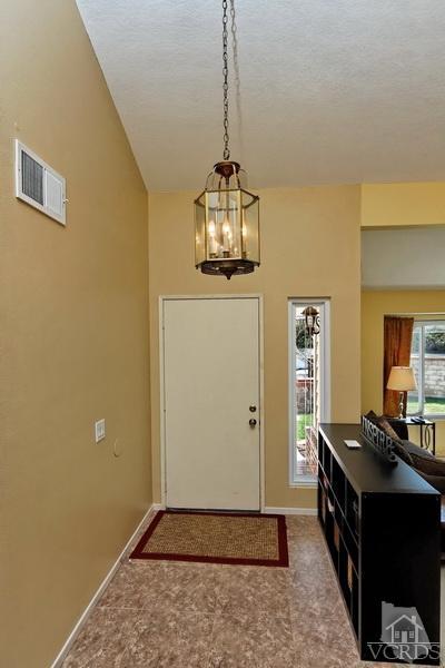 3903 Southhampton Road Moorpark, CA 93021 - Photo 3 of 29 a living room with a table