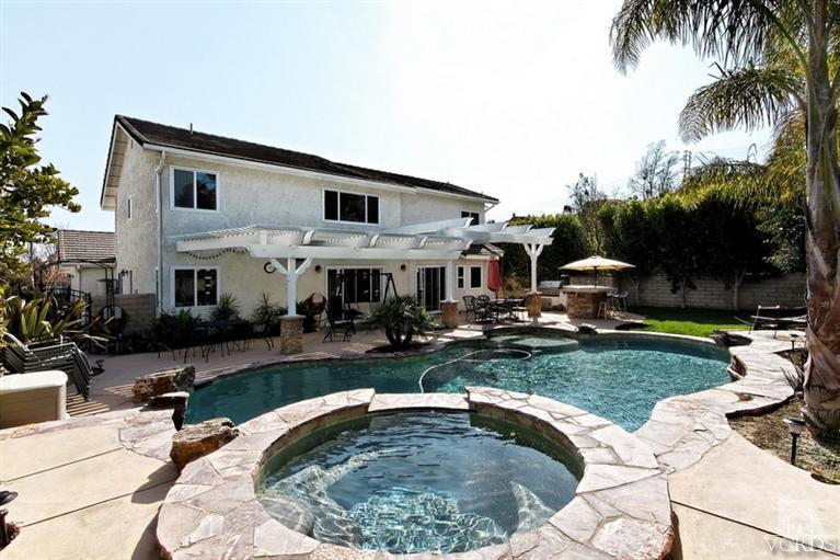 3903 Southhampton Road Moorpark, CA 93021 - Photo 23 of 29 a view of a house with swimming pool and sitting area
