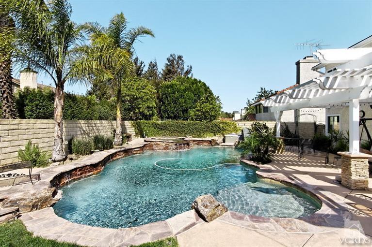 3903 Southhampton Road Moorpark, CA 93021 - Photo 27 of 29 a view of a swimming pool with a patio
