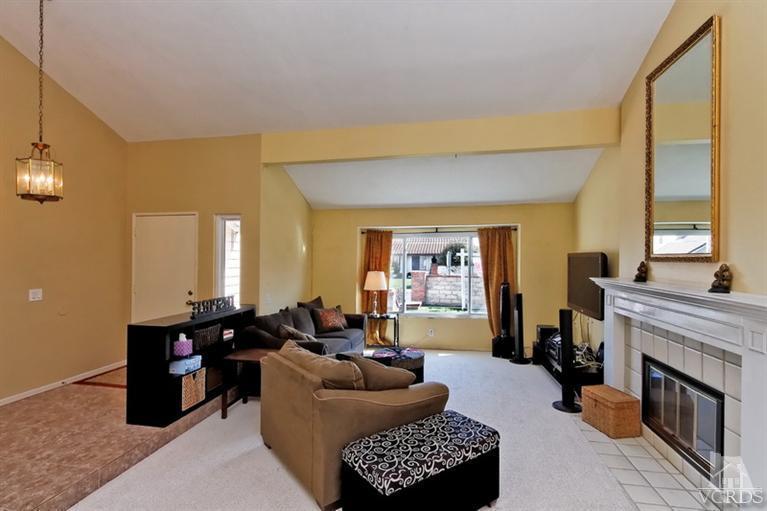 3903 Southhampton Road Moorpark, CA 93021 - Photo 6 of 29 a living room with furniture and a fireplace