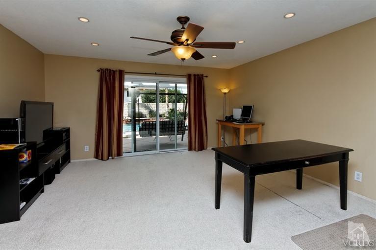 3903 Southhampton Road Moorpark, CA 93021 - Photo 8 of 29 a view of a livingroom with furniture and a ceiling fan