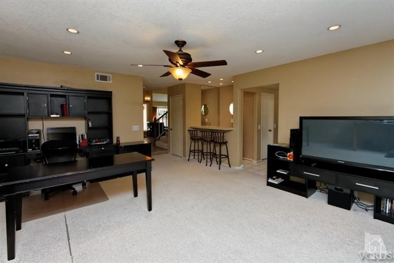 3903 Southhampton Road Moorpark, CA 93021 - Photo 9 of 29 a living room with furniture and a flat screen tv