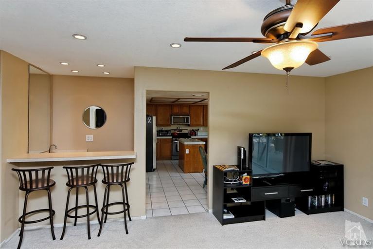 3903 Southhampton Road Moorpark, CA 93021 - Photo 10 of 29 a kitchen with a refrigerator and microwave