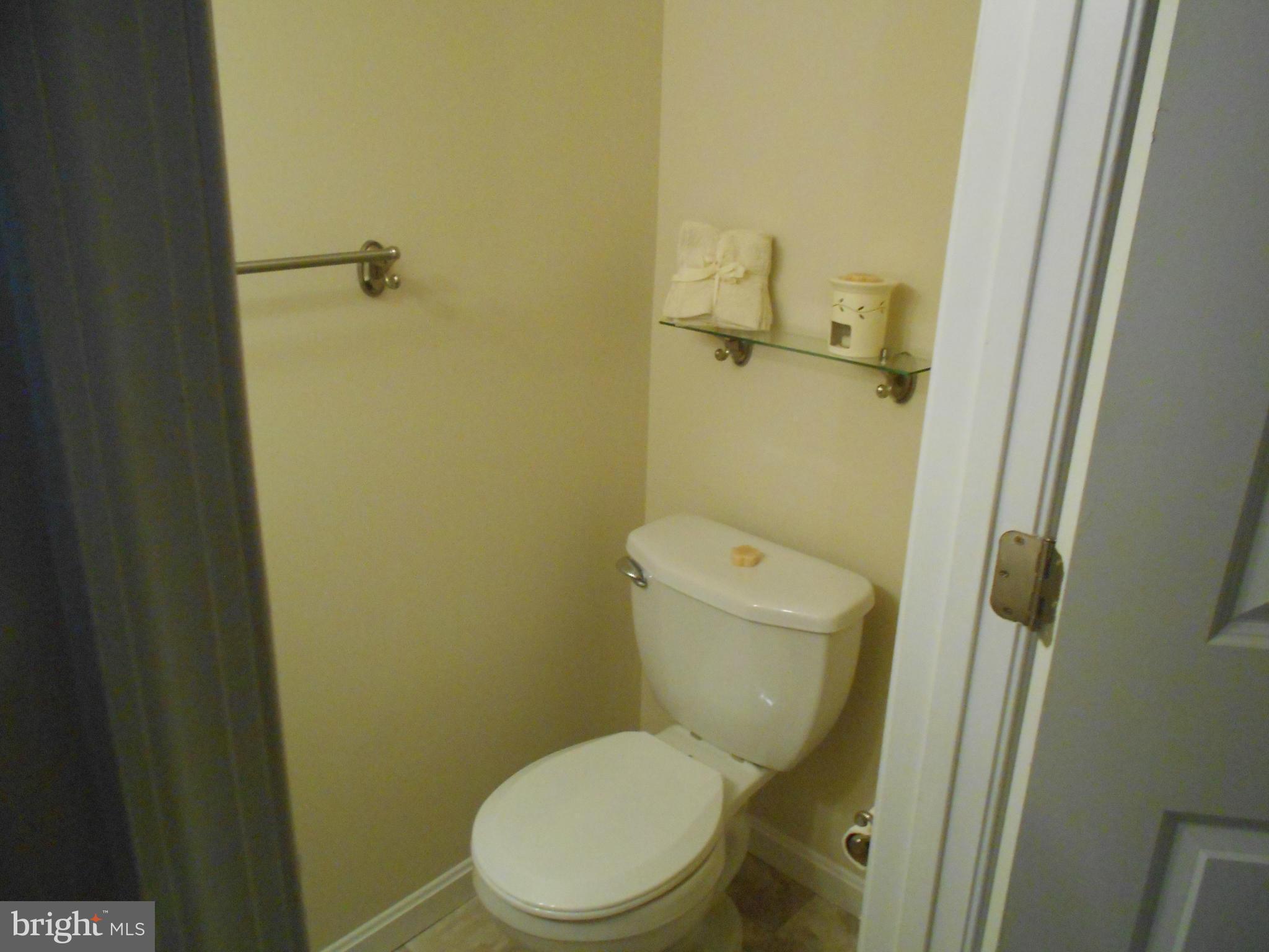 418 Torner Road Baltimore, MD 21221 - Photo 22 of 30 a white toilet sitting next to a sink