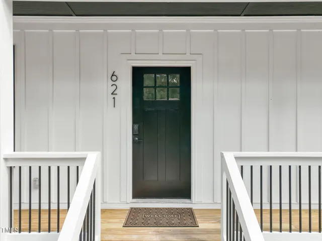 a view of entryway with a front door