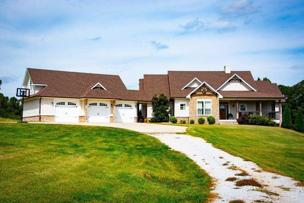 920 Highway 5 Roopville, GA 30170 - Photo 1 of 1 a front view of a house with a yard