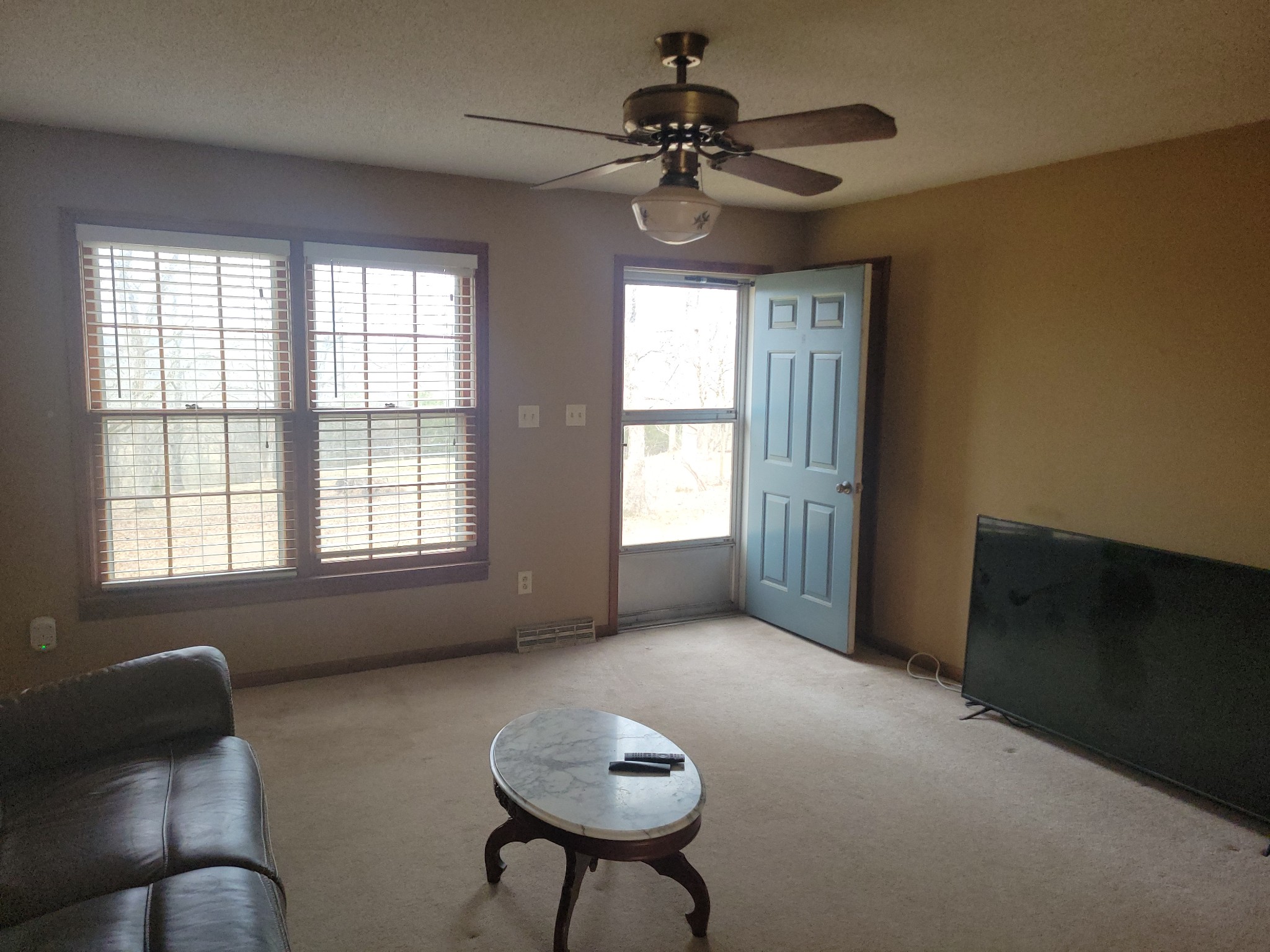 171 Trinity Lane Pulaski, TN 38478 - Photo 7 of 16 a living room with furniture and a window