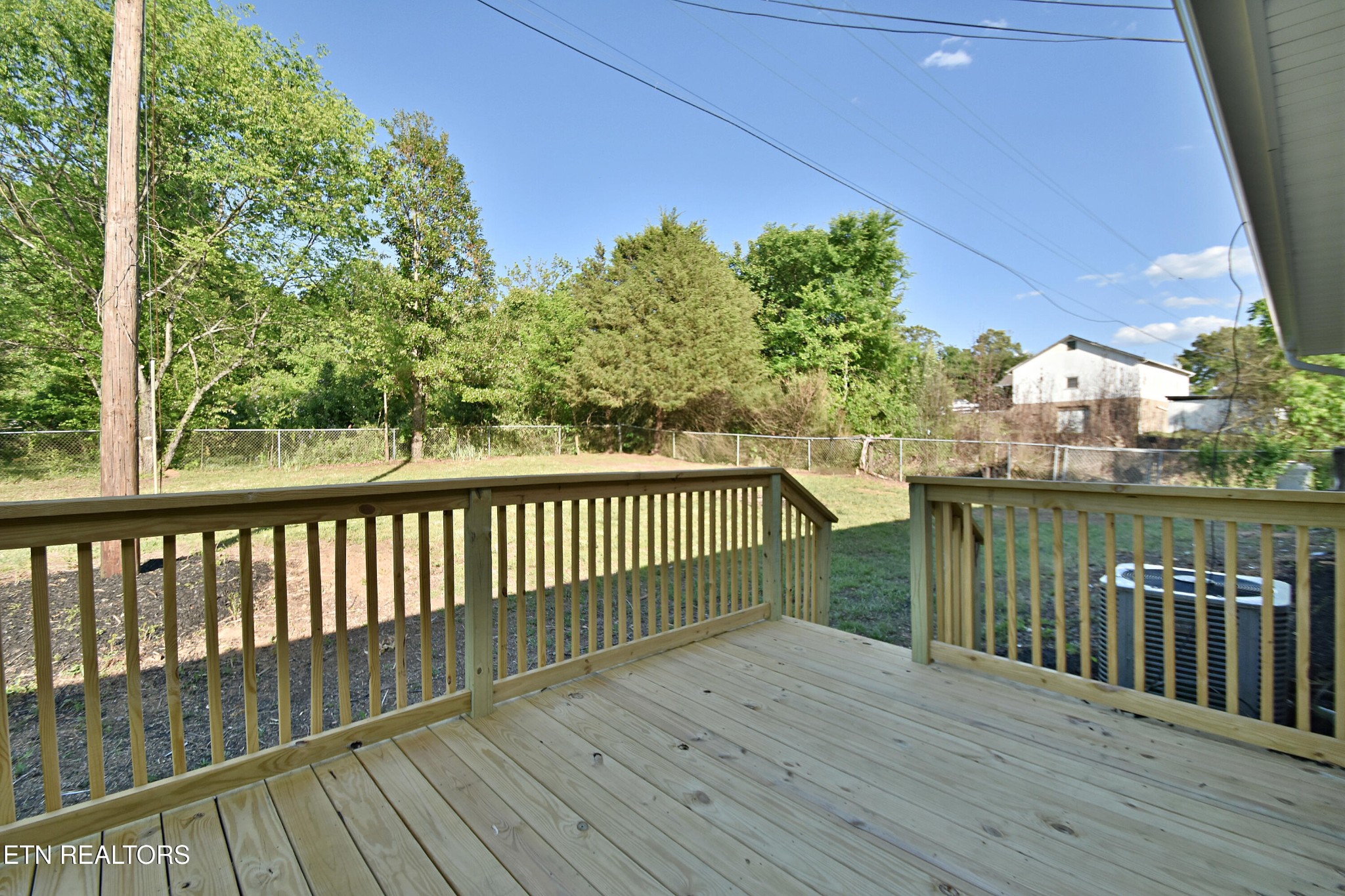 1119 Rudd Road Greenback, TN 37742 - Photo 3 of 28 a view of a balcony with wooden floor