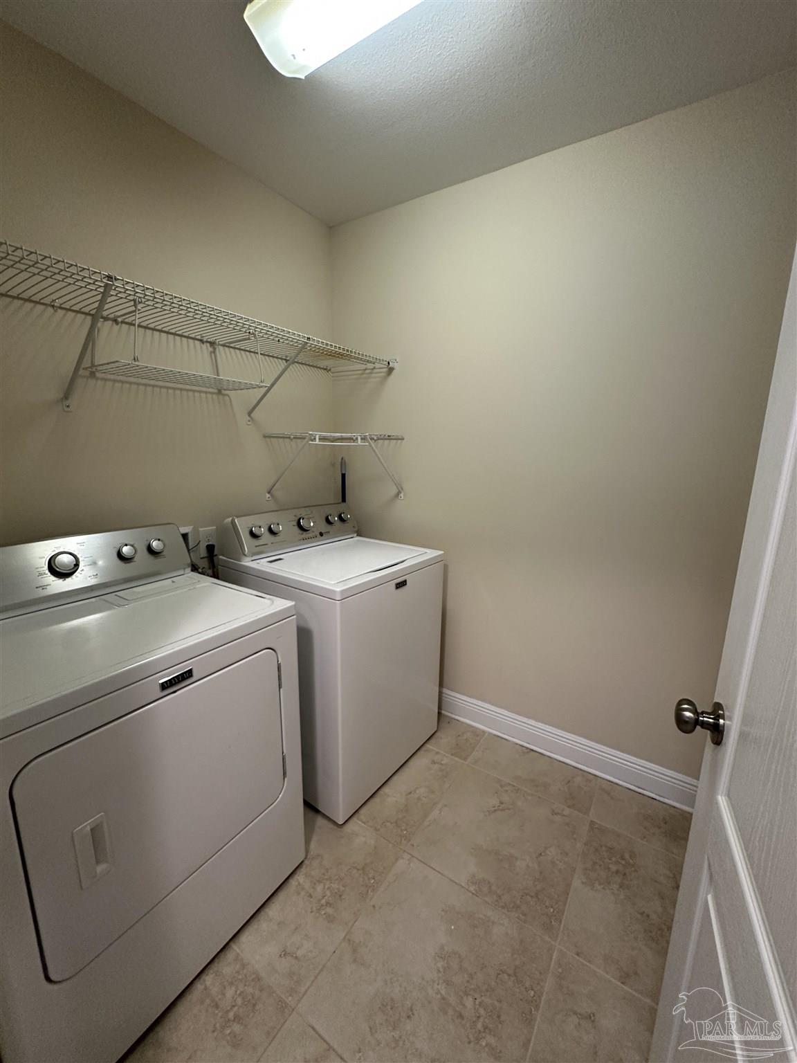 7329 Farmers Road Pensacola, FL 32526 - Photo 23 of 27 a utility room with dryer and washer