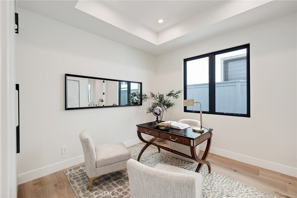 1813 Walnut Avenue Manhattan Beach, CA 90266 - Photo 42 of 73 a living room with furniture and a window