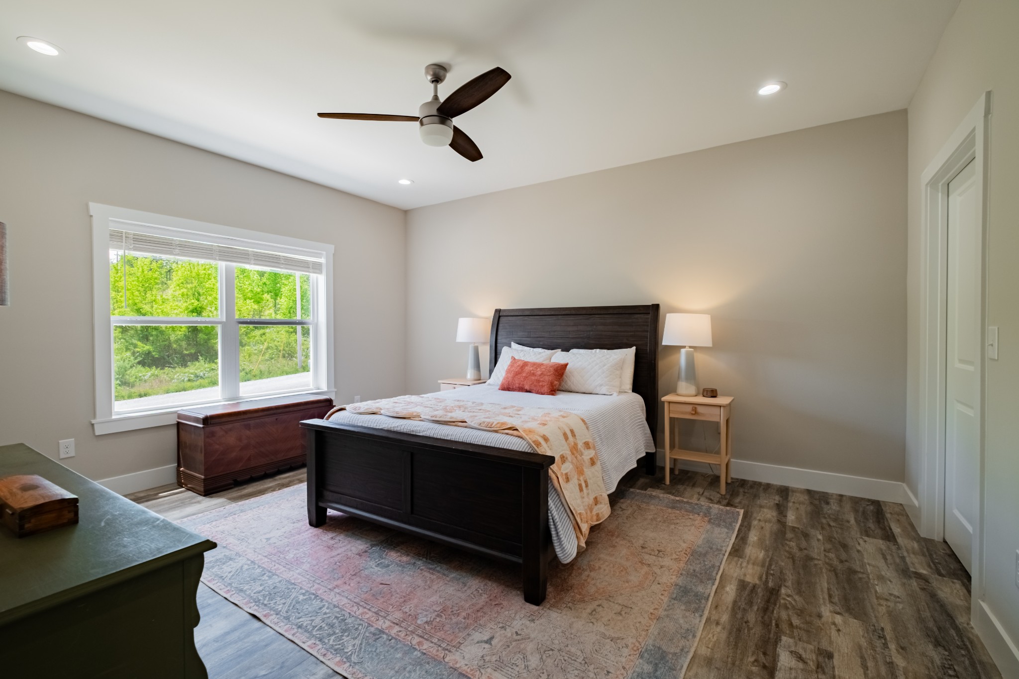 55 Rustling Pnes Road Dunlap, TN 37327 - Photo 16 of 45 a bedroom with a bed and a large window