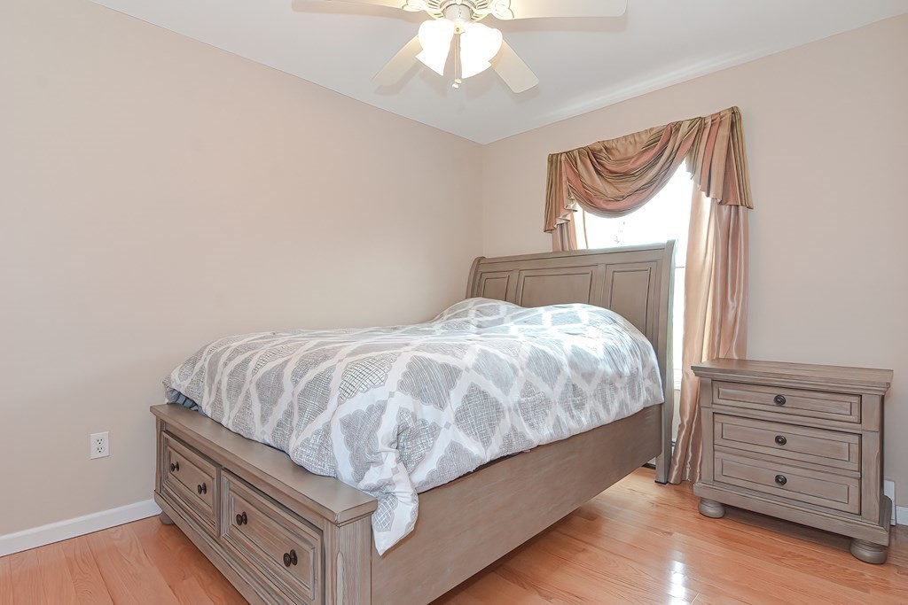 41 Boston Hill Road Fairhaven, MA 02719 - Photo 15 of 32 a bedroom with a bed and dresser