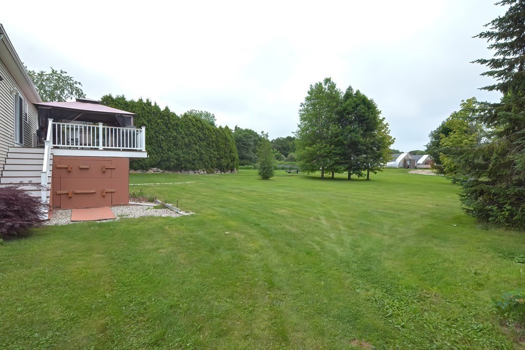 41 Boston Hill Road Fairhaven, MA 02719 - Photo 27 of 32 a front view of a house with a garden