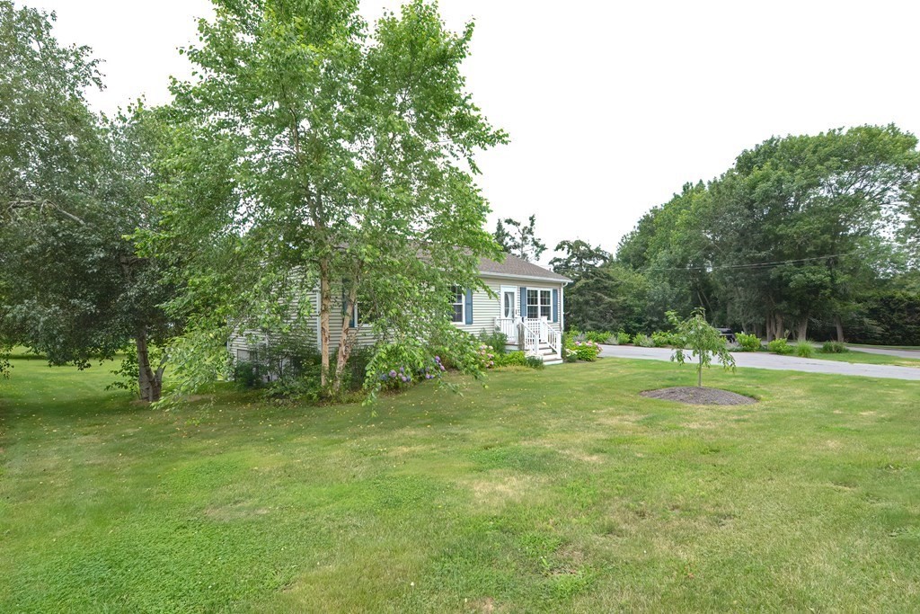 41 Boston Hill Road Fairhaven, MA 02719 - Photo 30 of 32 a front view of a house with a yard