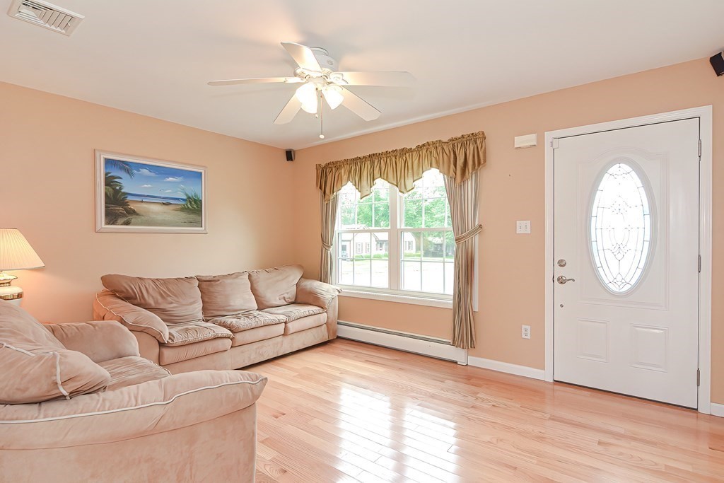 41 Boston Hill Road Fairhaven, MA 02719 - Photo 3 of 32 a living room with furniture and a large window