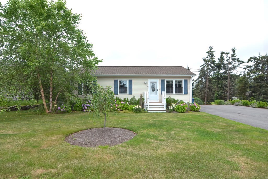 41 Boston Hill Road Fairhaven, MA 02719 - Photo 31 of 32 a front view of a house with a yard