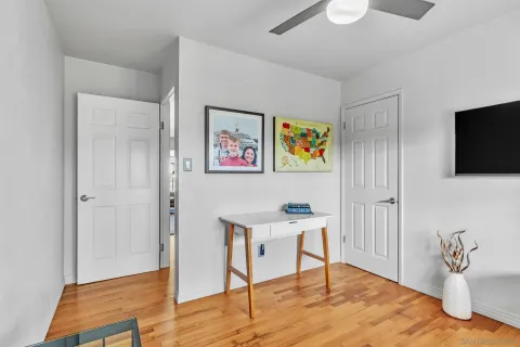 a workspace with furniture and wooden floor