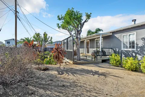 a view of a backyard of the house